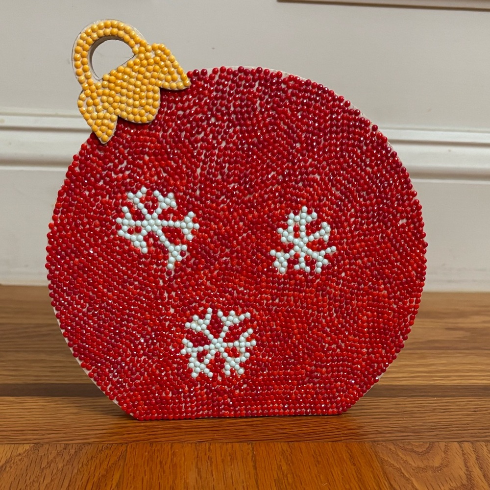 Festive Red Beaded Ornament with Snowflake Design